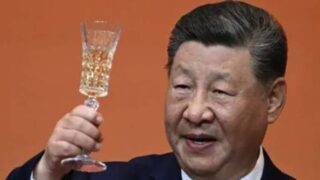 XI